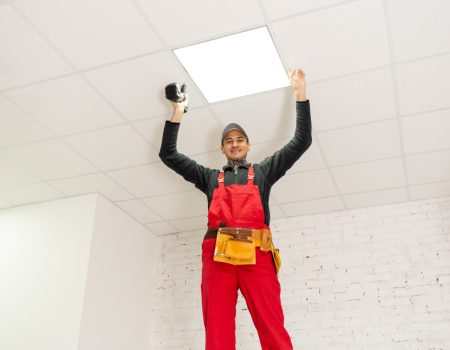 Ceiling installation with expert technicians In the room that is in the construction process